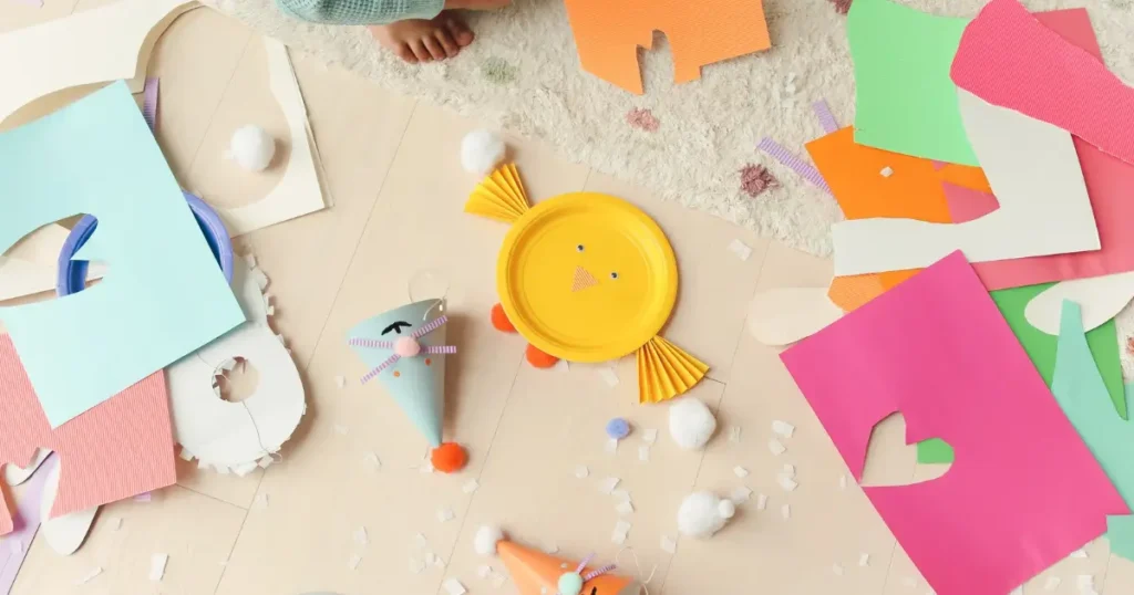 easy crafts for toddlers - toddler doing handprint painting